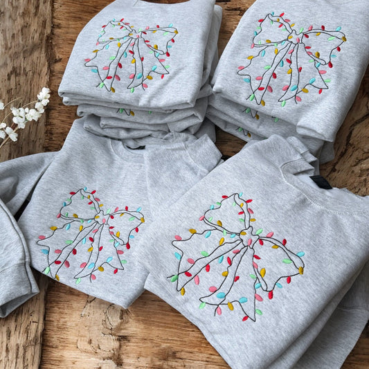 Christmas Light Bow Sweatshirt