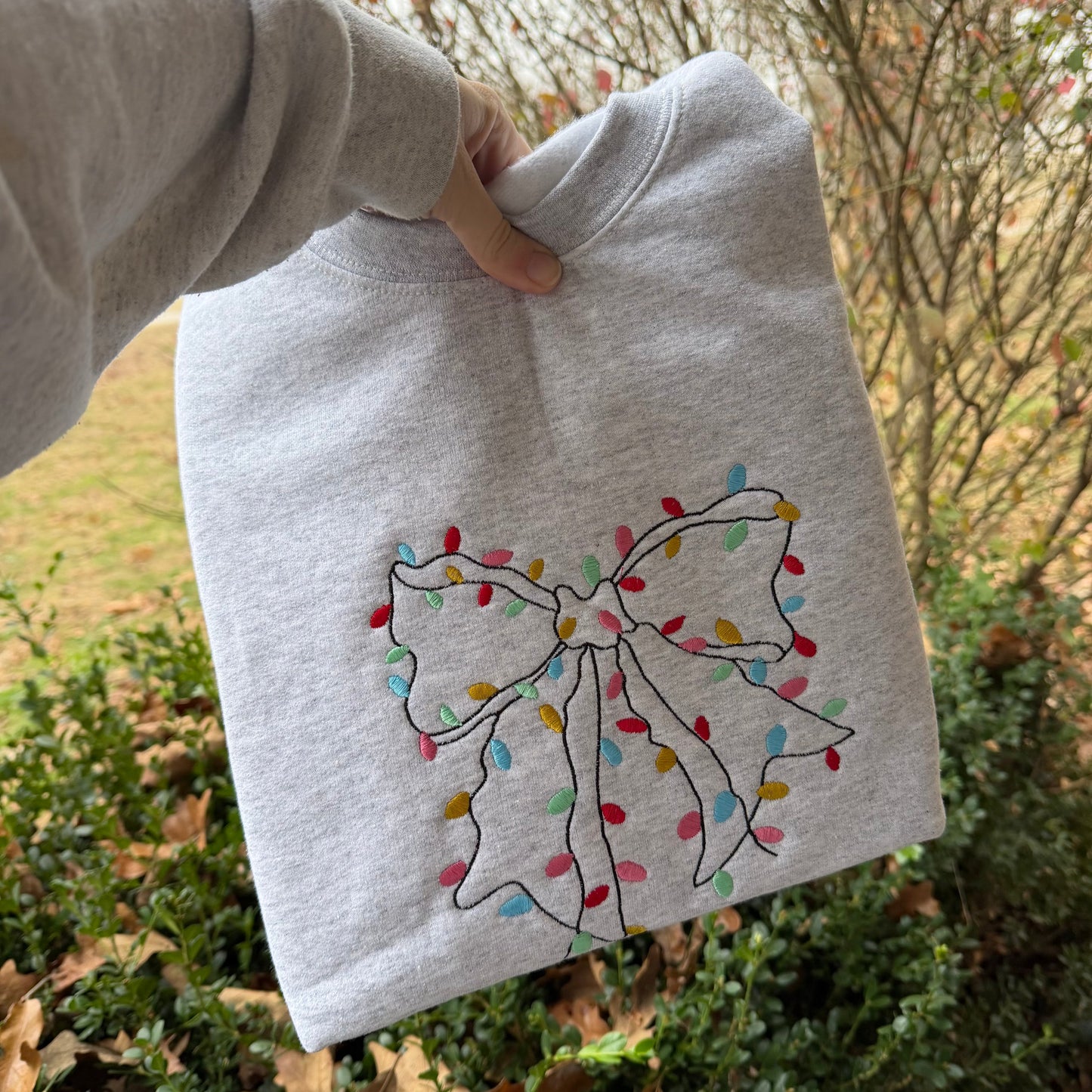 Christmas Light Bow Sweatshirt
